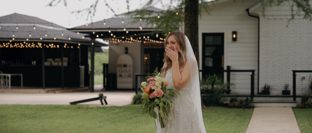 Dallas Wedding Videographer | Kaitlin and Isaiah | The Emerson Venue Wedding - bride first look