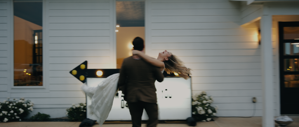 Dallas Wedding Videographer | Kaitlin and Isaiah | The Emerson Venue Wedding - blurry spinning couple