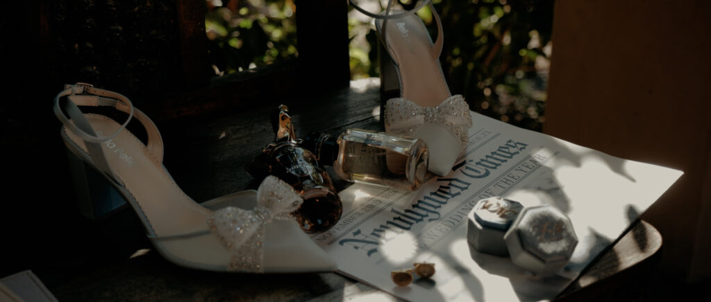 Videography for Wedding Dallas | Houston Wedding Videography | Amanda and Jacob | - Amanda's heels and wedding details outside