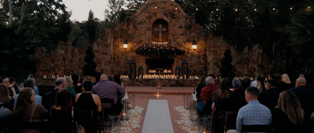Videography for Wedding Dallas | Houston Wedding Videography | Amanda and Jacob | - Guests waiting for the evening ceremony to start with candles