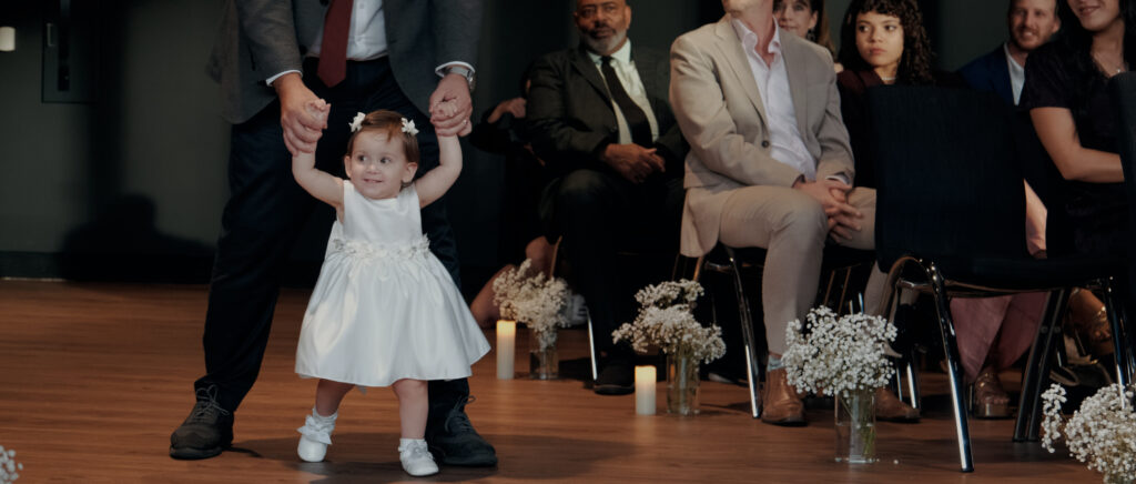 Videography for Wedding Dallas | Austin Wedding Videography | Molly and Oliver | - Molly's little niece being helped down the aisle