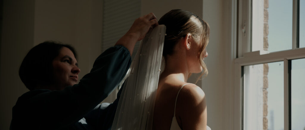 Videography for Wedding Dallas | Tegan and Dayd | - Crazy Water Hotel Wedding Video - Mom helping bride with her veil
