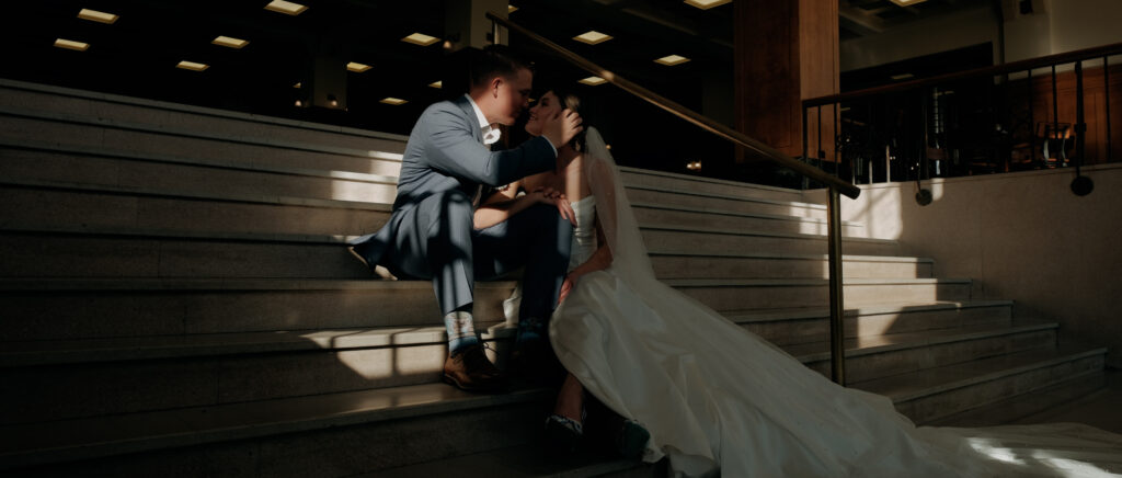 Videography for Wedding Dallas | Tegan and Dayd | - Crazy Water Hotel Wedding Video - bride and groom portraits on the stairs looking into each other's eyes